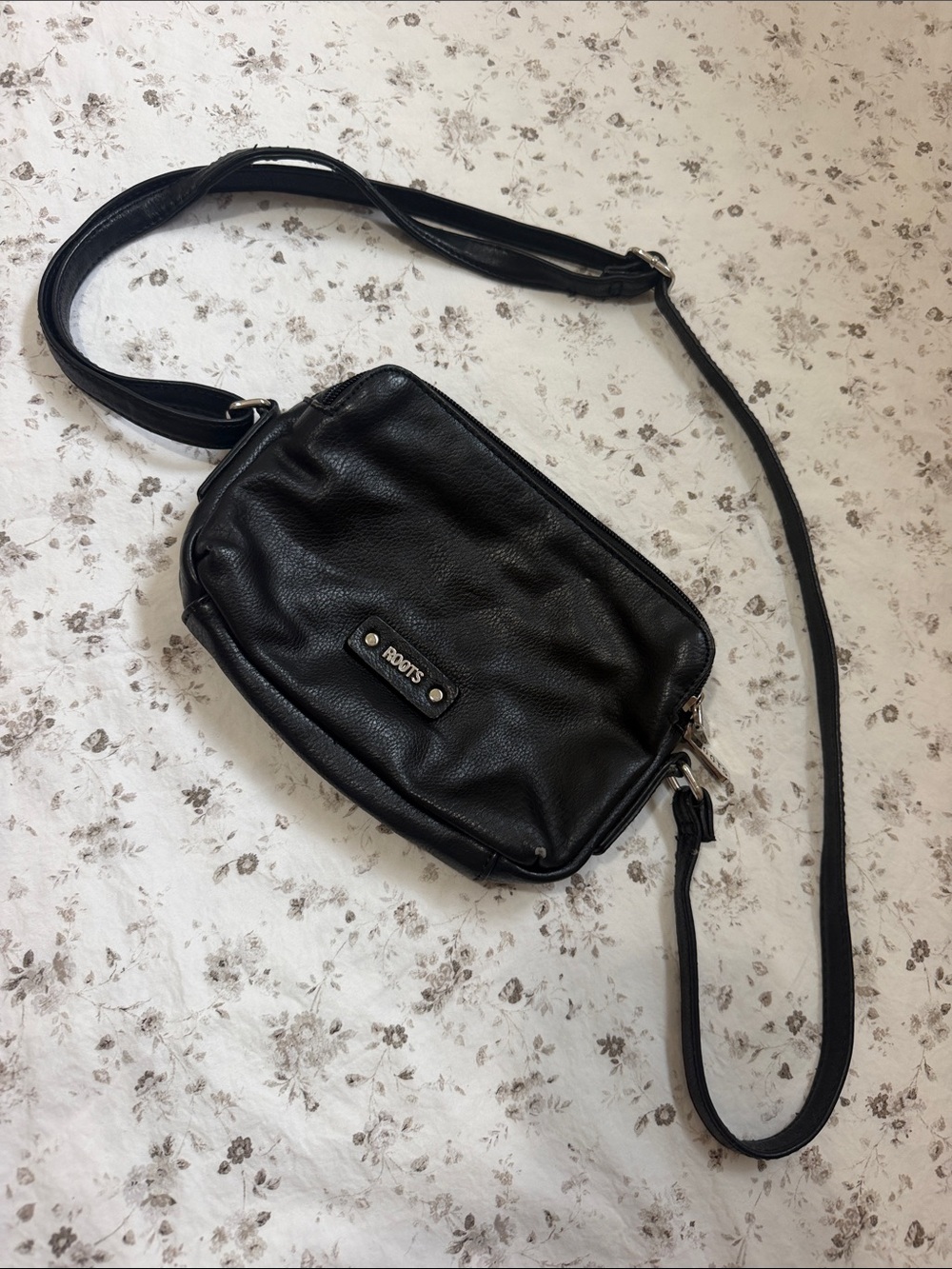 Roots Black Pebbled Crossbody Bag with Adjustable Strap